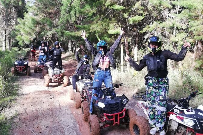 ATV Adventure: Mountains and Forest Tour - Forest paths, rain, and the reward of getting muddy