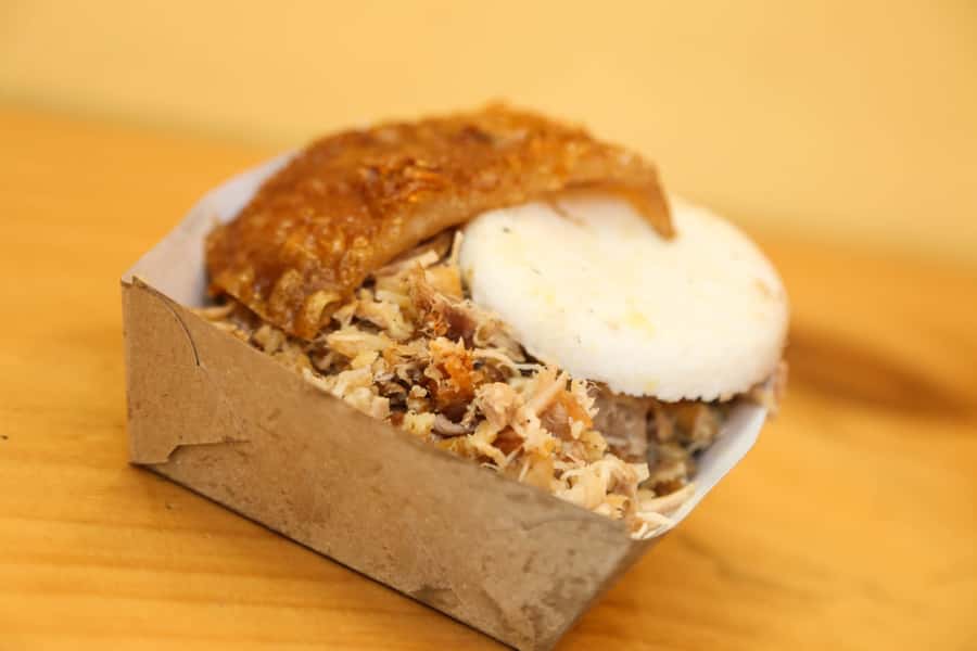 Bogota Food Tour with over 12 Tastings & Tejo - Lechona in a small local eatery