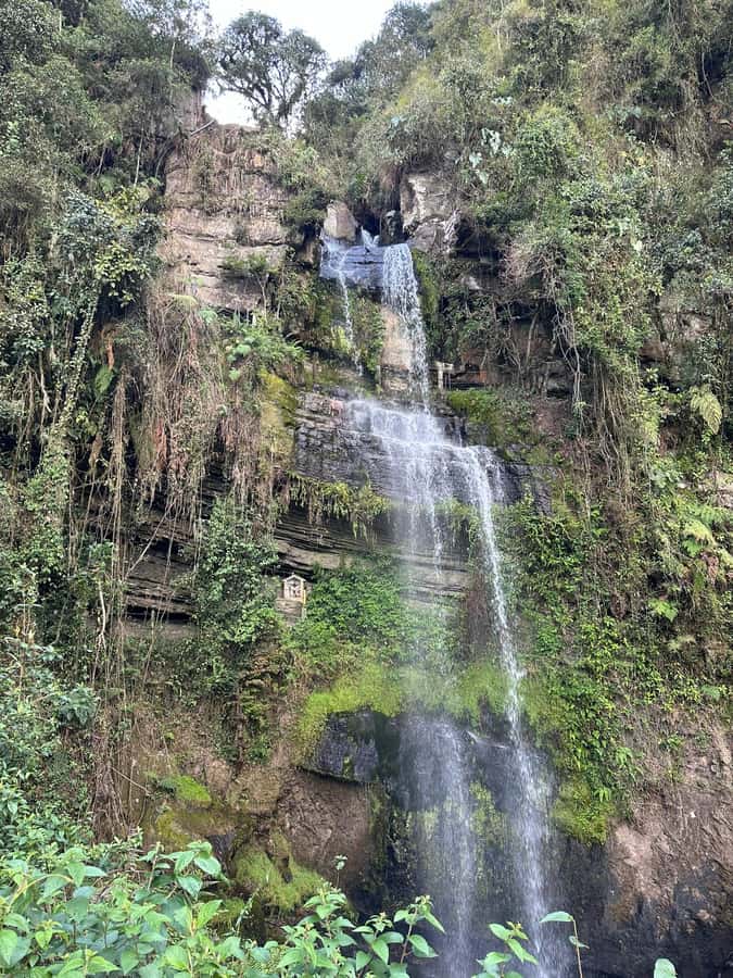 Bogota: Hike to La Chorrera Waterfall, El Chiflón and Guadalupe Hill - Walking behind El Chiflón