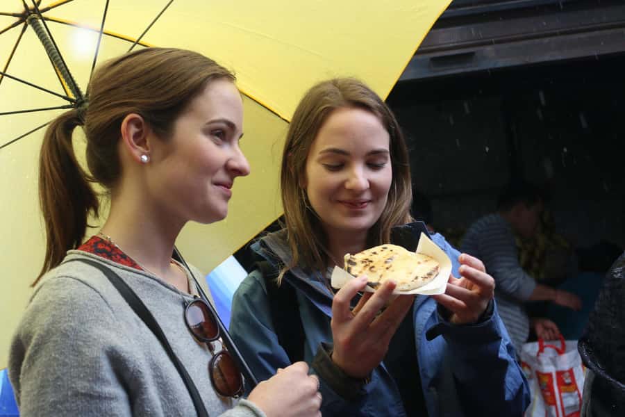 Bogotá: La Candelaria Food Tour with Tastings - Pickup, timing, and the airport option