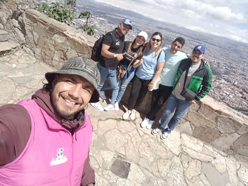 Bogotá: Private City Tour, Monserrate, Emerald and Botero - Entering La Candelaria on foot
