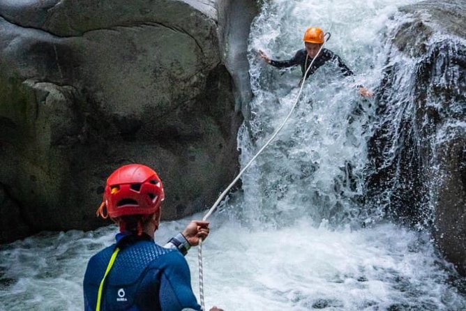 Canyoning Guatape River - Getting fitted for helmet, harness, and neoprene