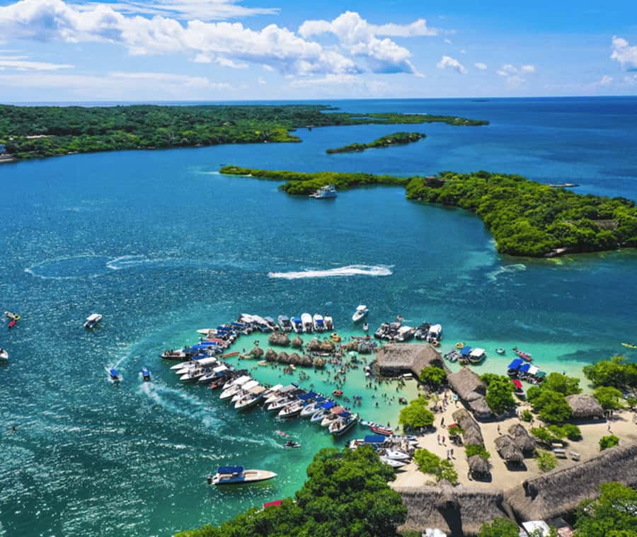Cartagena: 4 Island Day Trip by Boat and Caribbean Lunch - Cholon is the loud, social stop