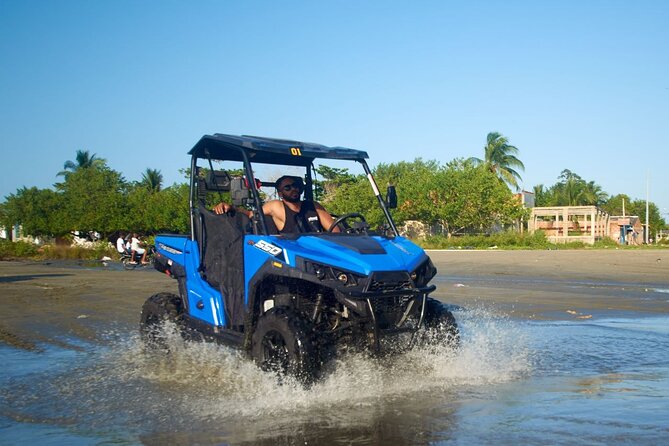 Cartagena ATV Buggy and Horseback riding Beach and Barrio Tour - Seeing a fishing village from the driver’s seat