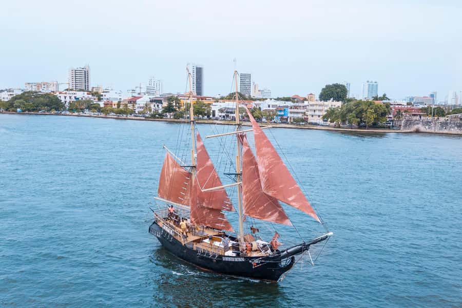 Cartagena, CO: Sunset Skyline Pirate Boat Tour with Drinks - Music, cannon fire, and pirate photos