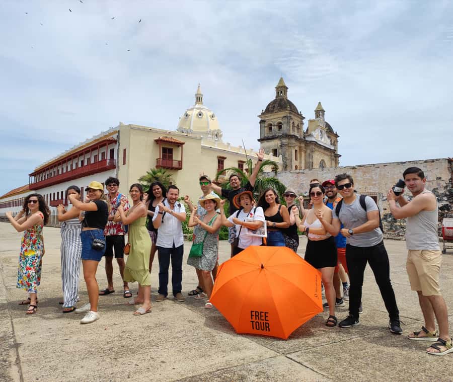Cartagena: Historic Center and Getsemaní Shared Walking Tour - Getsemaní, umbrellas, graffiti, and local identity