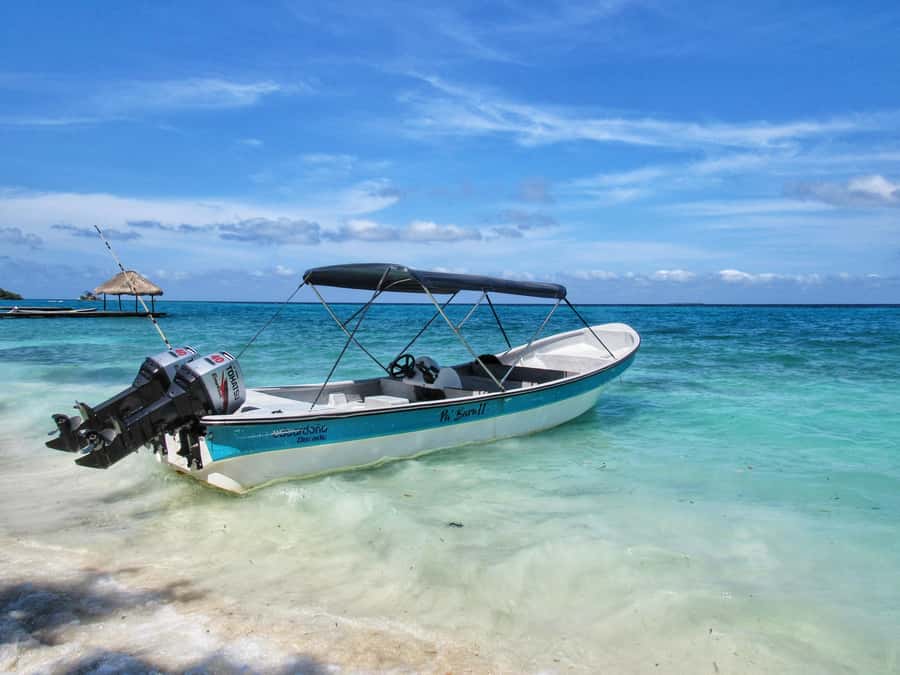 Cartagena: Rosario Island and Mangroves Private Day Trip - A beach stop with a welcome drink