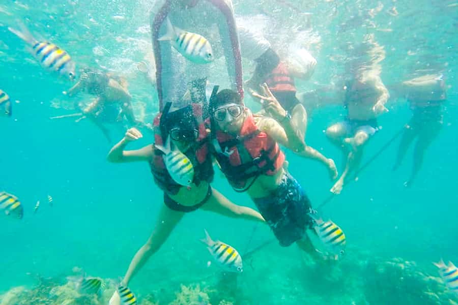 Cartagena: Snorkel, Mangroves and Playa Blanca Tour - Boarding the boat at Baru