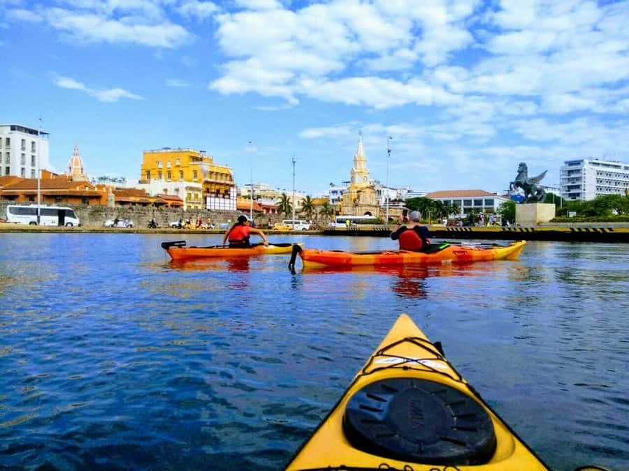 Cartagena: Walled City Kayak Tour - Crossing the channel toward the clock tower