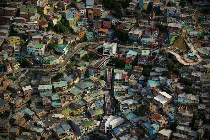 Comuna 13 & Downtown: From violence to innovation - Riding metro, Metrocable, and bus across Medellín