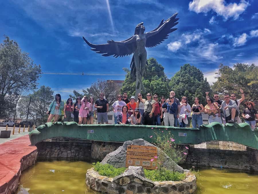 From Medellin: Guatapé & Peñol Rock with Boat & farm animals - Walking through colorful Guatapé