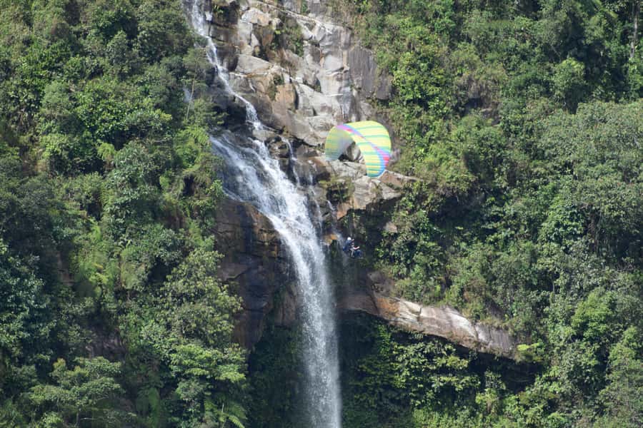 From Medellín: Paragliding and Rafting Combo Tour - From Medellín to canyon country