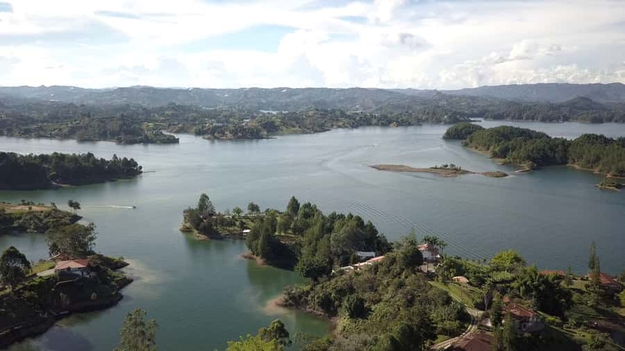 From Medellín: Paragliding Flight and Guatape Tour - Arriving in colorful Guatapé