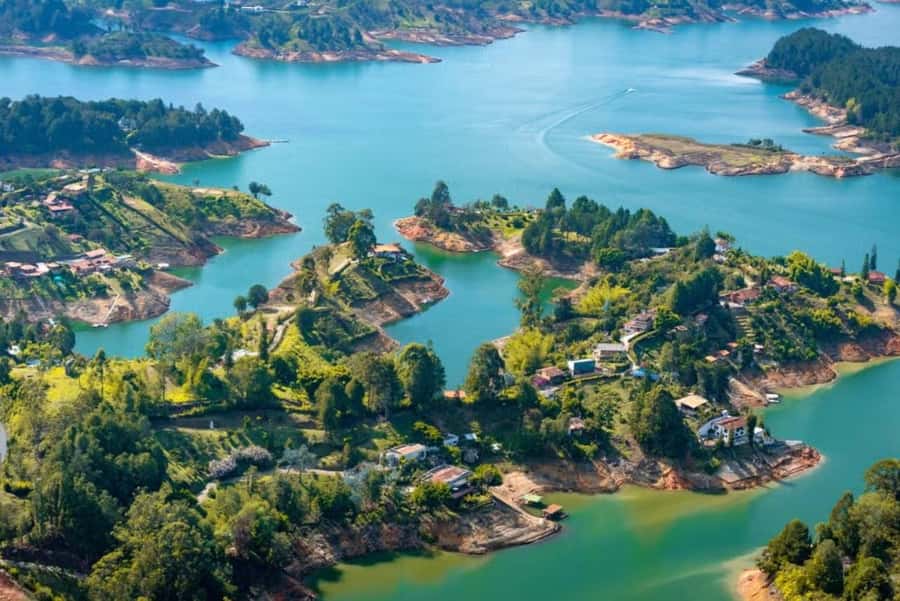 Guatape: Paragliding Experience - Getting ready with a helmet and harness