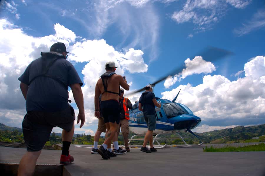 Medellín: Guatapé Private Tour with Helicopter & Boat Ride - Cruising the lake in a private boat