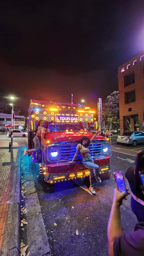 Medellin: Party Bus with DJ & Street Food Tastings - Meeting in El Poblado on Calle 9