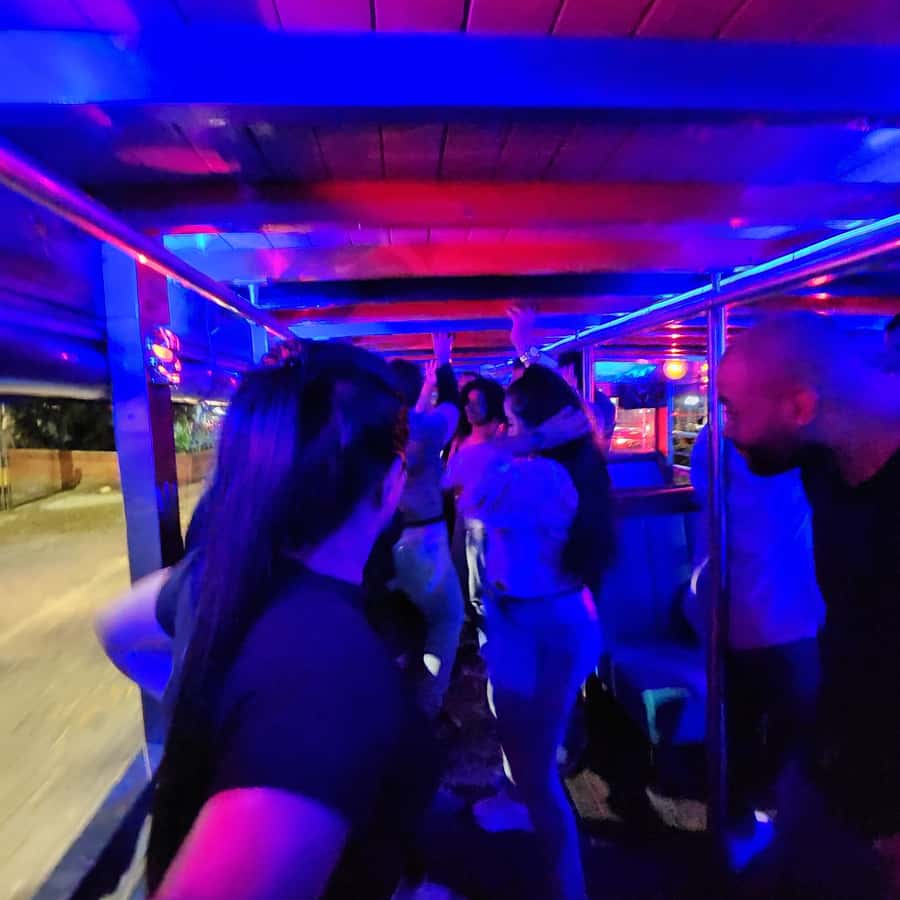 Medellin: Party Bus with DJ & Street Food Tastings - The Golden Mile and Medellín’s polished side