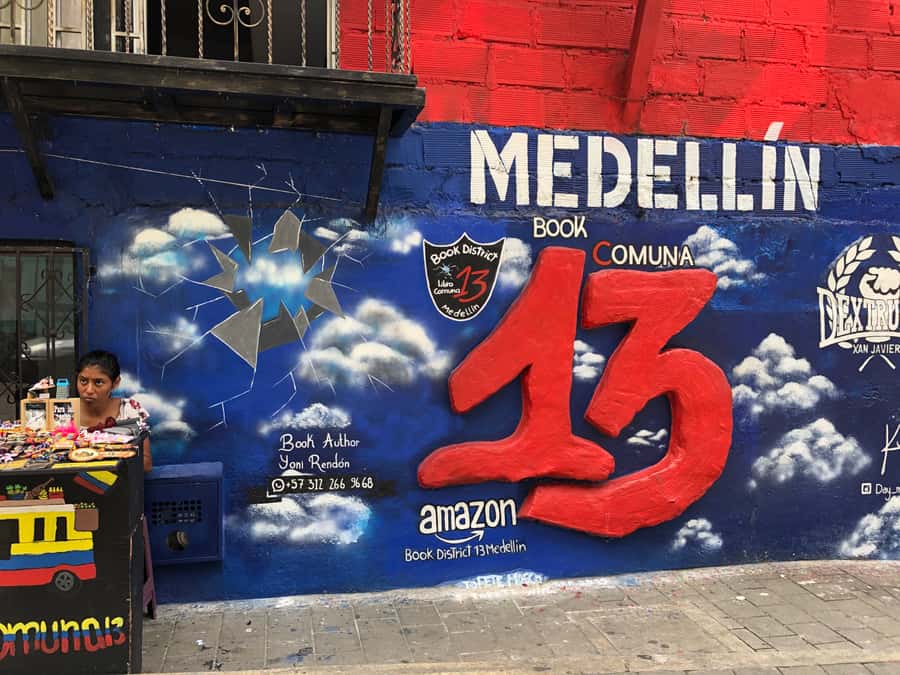 Medellín: Private Comuna 13 Street Art Tour - Taking the cable car toward Comuna 13