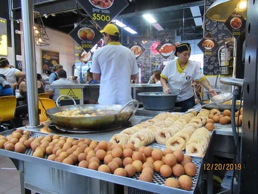 Medellín: Private Food Tour With The Best Viewpoints. - Sabaneta slows the pace with park life and familiar snacks