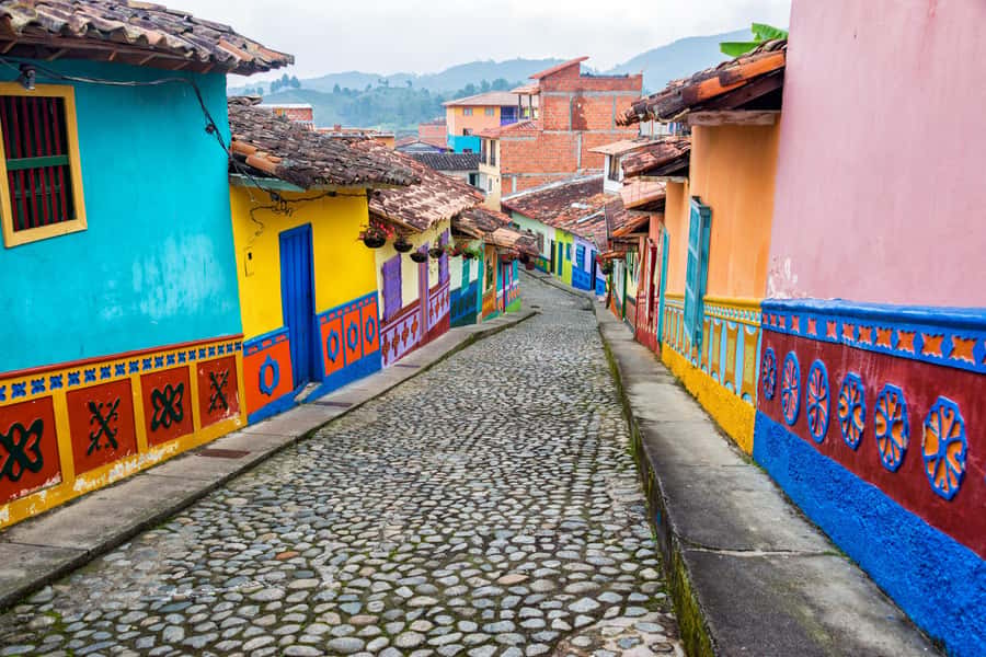 Medellín: Private Guatapé with Peñol Tickets and Boat Ride - Reaching the top of El Peñol Rock