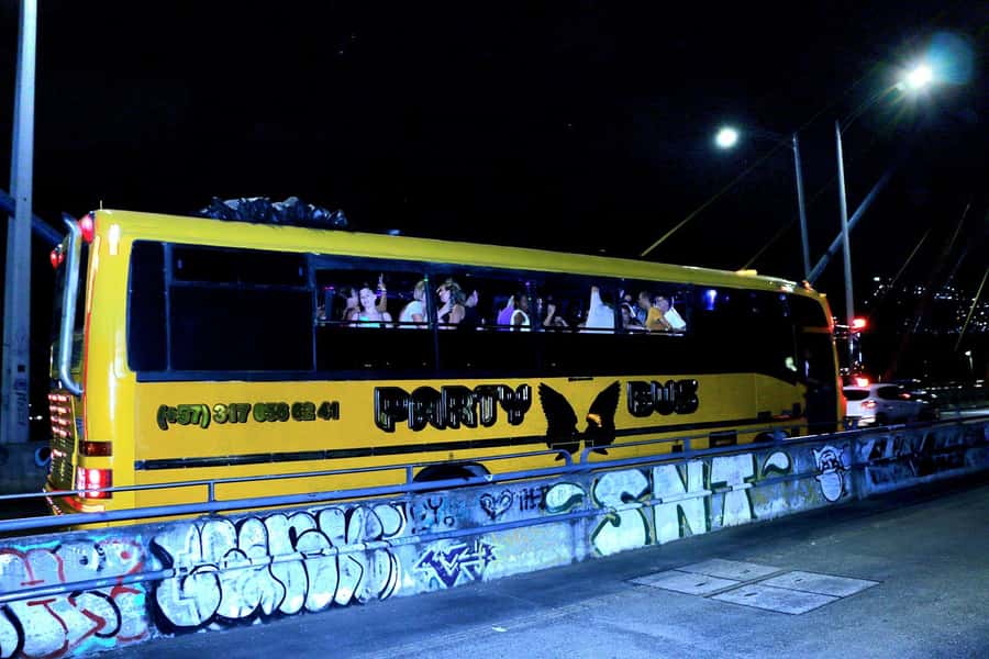 Medellin: Rumbero Party Bus with all the beer you can drink - Milla de Oro Avenue and the polished side of the city