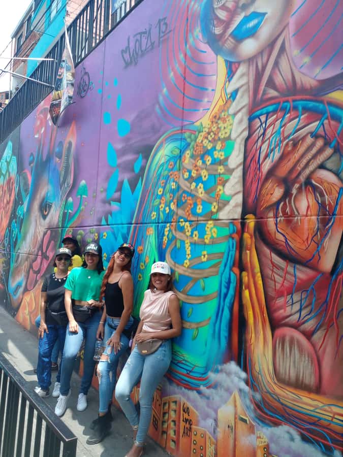 Medellin: Tour Pablo Escobar y Comuna 13 Privado - A mural, a neighborhood, and the human cost