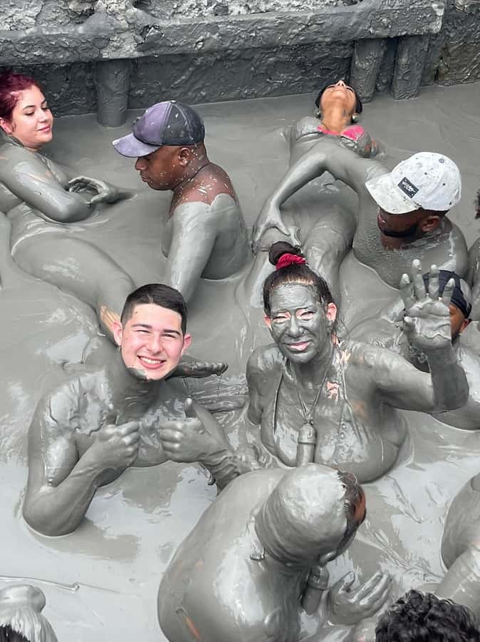 Mud Volcano Tour in Cartagena with Lunch - Washing off with help from the local community