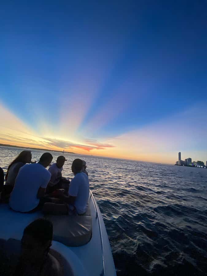 Nightlife: sunset boat party + tour of the old town - Returning to Cartagena at 7 pm