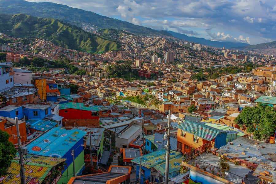 pablo, comuna 13 & cable car express tour - The cemetery house where Pablo Escobar died