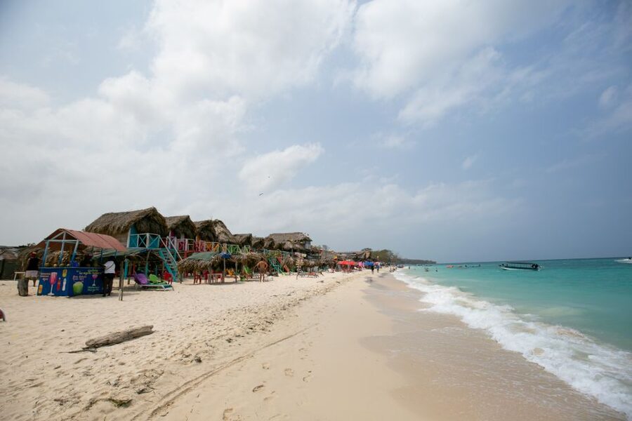 Playa Blanca Full-Day Trip from Cartagena - Arriving at Playa Blanca’s white sand and clear water