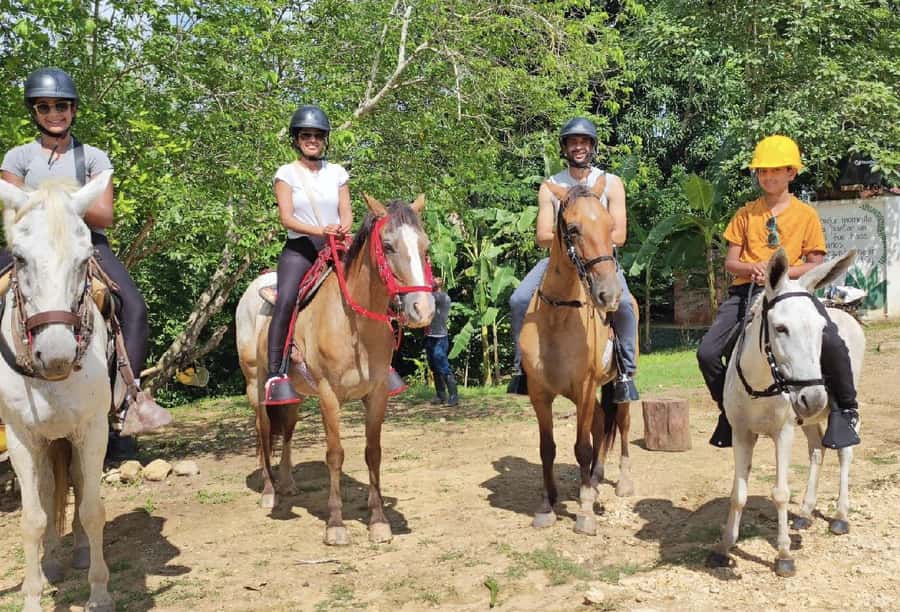 Scenic Horseback Ride in Tropical Mountain Reserve - Monkeys, macaws, and local farmers add human scale