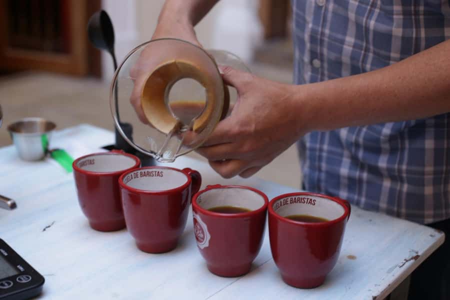 Shared Tour Bogota's Street Local Food - Hot chocolate with cheese is part of the lesson