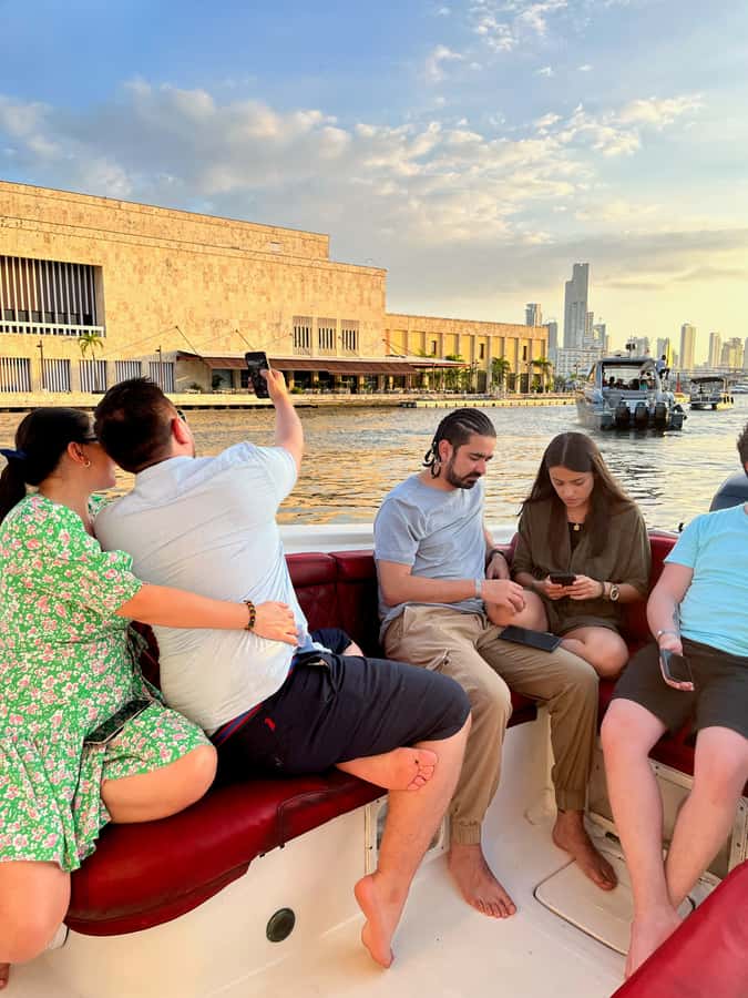 Sunset boat tour open bar and free club entrance Cartagena - Cartagena Bay at sunset, with a party already underway