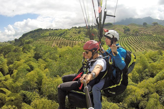 Unique experience flying paragliding - Starting at Éxtasis Café in Plaza de Buenavista